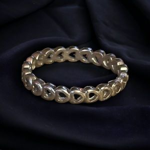 Silver tone open hearts ring